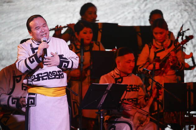 TYVA REPUBLIC, RUSSIA - FEBRUARY 12, 2021: Members of the Tuvan National Orchestra give a concert at Kok-ool Music and Drama Theatre as part of Shagaa (Lunar New Year) celebrations in the Tuvan capital of Kyzyl. The Year of the White Metal Cow has followed the Year of the White Metal Rat standing first in the traditional Buddhist twelve-year cycle. Kirill Kukhmar TASS  TS0F6A40