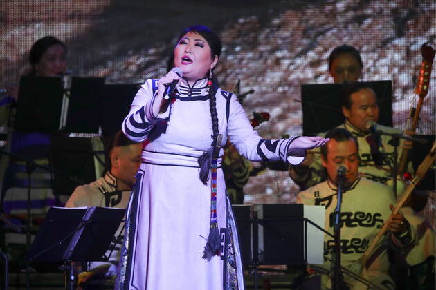 TYVA REPUBLIC, RUSSIA - FEBRUARY 12, 2021: Members of the Tuvan National Orchestra give a concert at Kok-ool Music and Drama Theatre as part of Shagaa (Lunar New Year) celebrations in the Tuvan capital of Kyzyl. The Year of the White Metal Cow has followed the Year of the White Metal Rat standing first in the traditional Buddhist twelve-year cycle. Kirill Kukhmar TASS  TS0F6A41