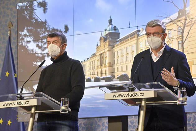 L-R Czech Prime Minister Andrej Babis and Deputy Prime Minister and Minister of Industry and Trade and Transport Karel Havlicek speak during a press conference after government talks with governors on COVID-19 measures and prolongation of state of emergency, on February 14, 2021, in Prague, Czech Republic. (CTKxPhoto VitxSimanek) CTKPhotoP202102140691201  VIS 005