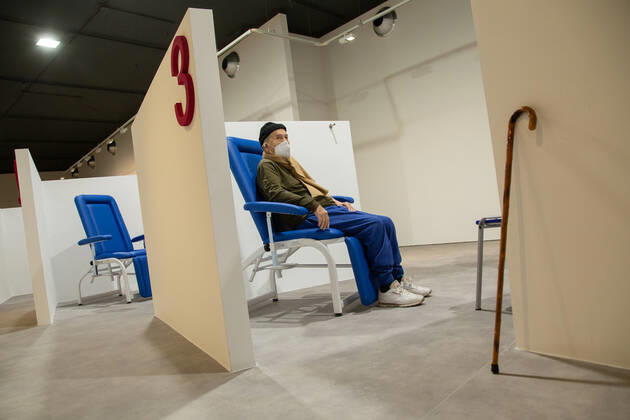 Italy: New area for anti-Covid vaccination in Rome A patient awaits vaccination in the new area dedicated to vaccinations in the Ennio Morricone Auditorium in Rome Rome Italy Copyright: MatteoxNardone