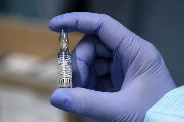 YEKATERINBURG, RUSSIA - FEBRUARY 17, 2021: An ampoule contains component 1 of the Gam-COVID-Vac (Sputnik-V) vaccine against COVID-19 used in a mobile vaccination unit set up at the Dirizhabl Airship shopping centre, vaccination free of charge, no prior appointment required. Donat Sorokin TASS  TS0F701A