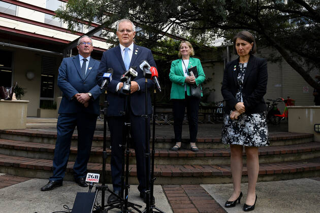 SCOTT MORRISON VACCINE HOSPITAL TOUR, Prime Minister Scott Morrison and NSW Premier Gladys Berejiklian address media following a tour of a COVID-19 vaccination hub at Royal Prince Alfred hospital in Sydney, Friday, February 19, 2021. The first COVID-19 vaccinations in NSW will take place on Monday, with the Pfizer jab to go out to frontline workers. ( NO ARCHIVING, EDITORIAL USE ONLY, NO USE IN BOOKS WITHOUT CONSENT Sydney NSW AUSTRALIA  Copyright: xDANxHIMBRECHTSx 20210219001521595050