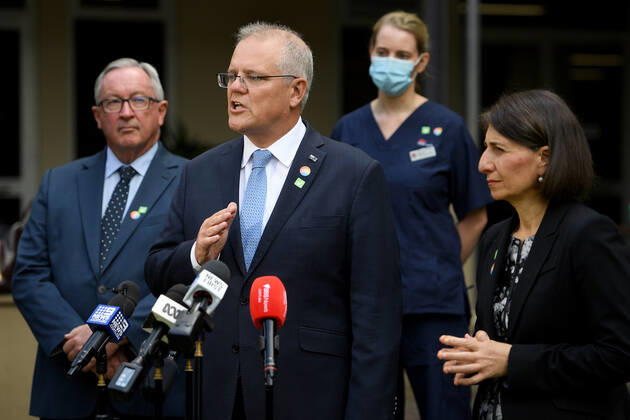 SCOTT MORRISON VACCINE HOSPITAL TOUR, Prime Minister Scott Morrison and NSW Premier Gladys Berejiklian address media following a tour of a COVID-19 vaccination hub at Royal Prince Alfred hospital in Sydney, Friday, February 19, 2021. The first COVID-19 vaccinations in NSW will take place on Monday, with the Pfizer jab to go out to frontline workers. ( NO ARCHIVING, EDITORIAL USE ONLY, NO USE IN BOOKS WITHOUT CONSENT Sydney NSW AUSTRALIA Copyright: xDANxHIMBRECHTSx 20210219001521595111