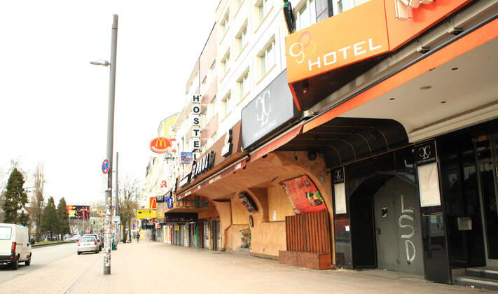 Closed shops on the nearly deserted Reeperbahn in Hamburg St Pauli during the lockdown St Pauli Hamburg