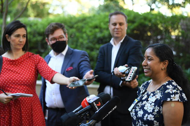 NSW COVID19 VACCINE ROLLOUT, Gayathry Vellangalloor, the first person to receive the Pfizer jab in NSW, speaks to media following the start of the COVID-19 vaccination program at Royal Prince Alfred Hospital in Sydney, Monday, February 22, 2021. ( NO ARCHIVING, EDITORIAL USE ONLY, NO USE IN BOOKS WITHOUT CONSENT SYDNEY NSW AUSTRALIA  Copyright: xJOELxCARRETTx 20210222001522239578