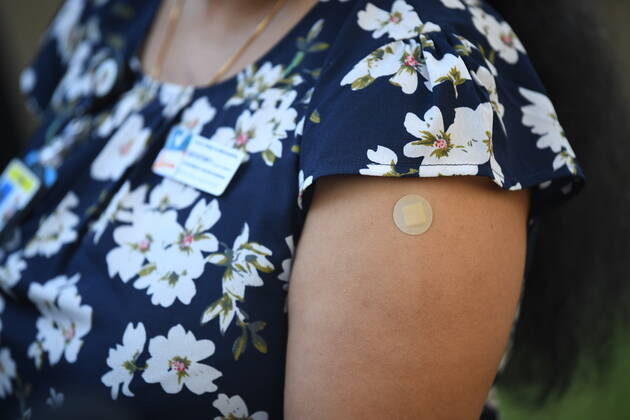 NSW COVID19 VACCINE ROLLOUT, Gayathry Vellangalloor, the first person to receive the Pfizer jab in NSW, speaks to media following the start of the COVID-19 vaccination program at Royal Prince Alfred Hospital in Sydney, Monday, February 22, 2021. ( NO ARCHIVING, EDITORIAL USE ONLY, NO USE IN BOOKS WITHOUT CONSENT SYDNEY NSW AUSTRALIA  Copyright: xJOELxCARRETTx 20210222001522240668