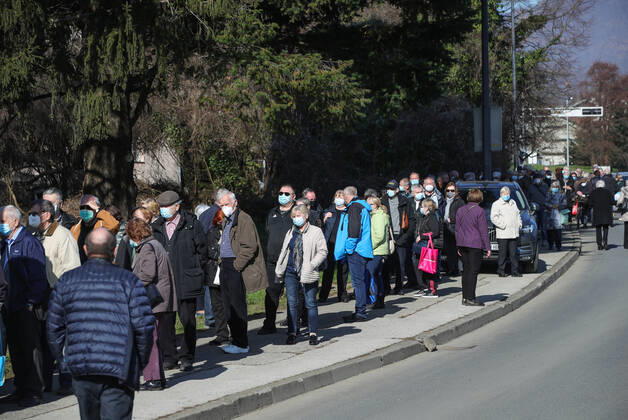 Vaccination in Zagreb, Croatia People wait in line to receive coronavirus disease (COVID-19) vaccine during a mass vaccination in Zagreb, Croatia on February 23, 2021. SanjinxStrukic PIXSELL