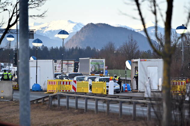 Border controls at the Austrian-German border ,border crossing Kiefersfelden border police officers control motorists,cars,trucks lorries,goods carriers,supply chain entering Bavaria from Tyrol Austria to Bavaria Germany