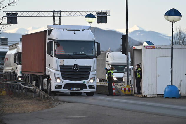 Border controls at the Austrian-German border ,border crossing Kiefersfelden border police officers control trucks, goods carriers, supply chain at the entry from Tyrol Austria to Bavaria Germany