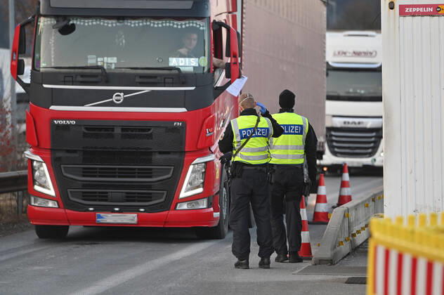 Border controls at the Austrian-German border ,border crossing Kiefersfelden border police officers control trucks, goods carriers, supply chain at the entry from Tyrol Austria to Bavaria Germany