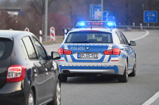 Border controls at the Austrian-German border ,border crossing Kiefersfelden Border police officers control motorists entering Bavaria from Tyrol Austria to Bavaria Germany A police car,patrol car guides rejected entrants to the next highway exit Entry refused,rejected,