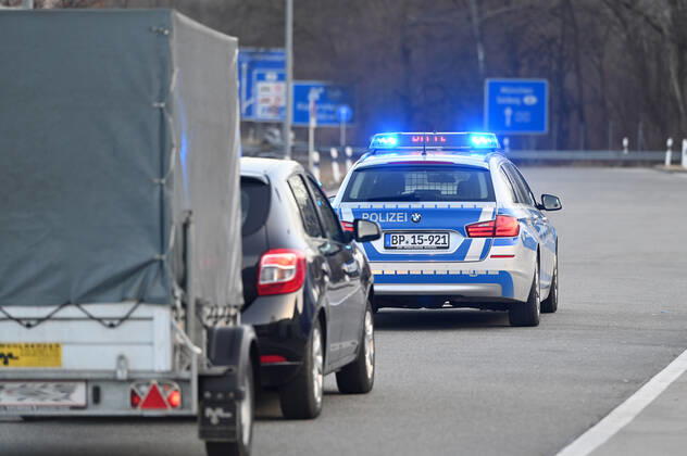 Border controls at the Austrian-German border ,border crossing Kiefersfelden Border police officers control motorists entering Bavaria from Tyrol Austria to Bavaria Germany A police car,patrol car guides rejected entrants to the next highway exit Entry refused,rejected,