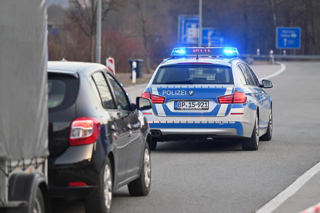 Border controls at the Austrian-German border ,border crossing Kiefersfelden Border police officers control motorists entering Bavaria from Tyrol Austria to Bavaria Germany A police car,patrol car guides rejected entrants to the next highway exit Entry refused,rejected,