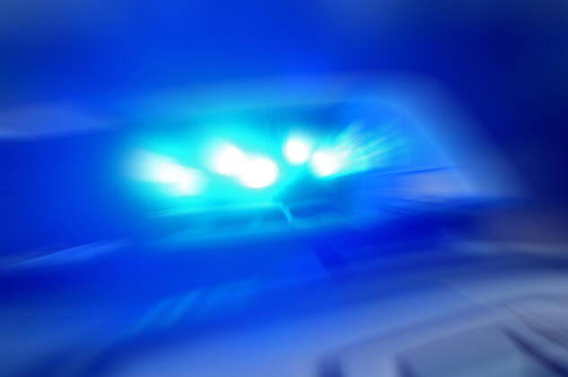 Border controls at the Austrian-German border ,Border crossing Kiefersfelden Border police officers control motorists entering Germany from Tyrol Austria to Bavaria Germany Blue light flashes on an emergency vehicle