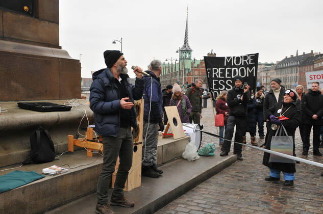 Copenhagen, Denmark. 23 February 2021, Danes proetesting againest coronavirus pandemic new debate in danish parliamenet about quick corona virus pandemic law in danish parliament with all political parties and stage anti pandemic law debates in front of danish parliament and danish police stand peaceful proteact danish parliament in front christiansborg danish parliament in Copenhagen. (Photo..Francis Dean Deanpictures)