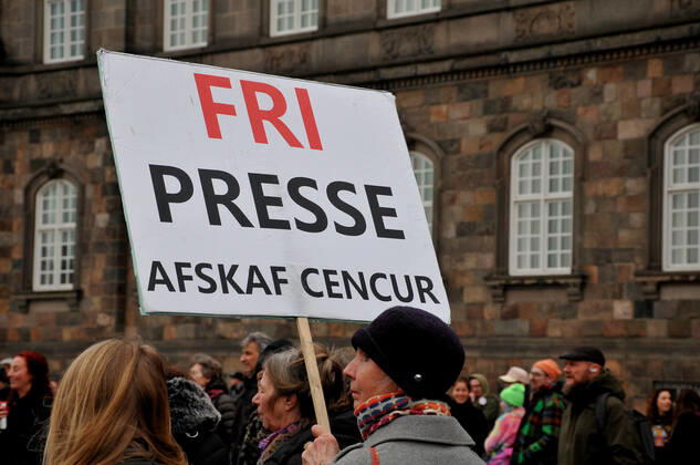 Copenhagen, Denmark. 23 February 2021, Danes proetesting againest coronavirus pandemic new debate in danish parliamenet about quick corona virus pandemic law in danish parliament with all political parties and stage anti pandemic law debates in front of danish parliament and danish police stand peaceful proteact danish parliament in front christiansborg danish parliament in Copenhagen. (Photo..Francis Dean Deanpictures)