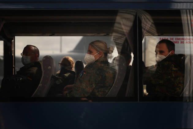 February 23, 2021, Lisbon, Portugal: German army medical experts are seen in a bus at Figo Maduro military airbase in Lisbon, Portugal on February 23, 2021. Based on a bilateral agreement, a second team of German army medical experts arrived in Portugal on Tuesday to replace the team that has been in Portugal since February 3 to assist the country in its fight against the COVID-19 pandemic. Lisbon Portugal - ZUMAf123 20210223_zap_f123_003 Copyright: xPedroxFiuzax