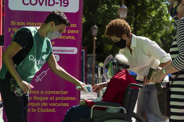 February 23, 2021, City of Buenos Aires, City of Buenos Aires, Argentina: INT. WorldNews. COVID-19. February 23, 2021. City of Buenos Aires, Argentina.- Adults older than 80 years old enter the temporary Vaccination Center at Centro Cultural Recoleta, City of Buenos Aires, Argentina, for being vaccinated for SARS CoV2 (COVID-19) on Feb 23, 2021. City of Buenos Aires Argentina - ZUMAf135 20210223_zap_f135_003 Copyright: xJulietaxFerrariox