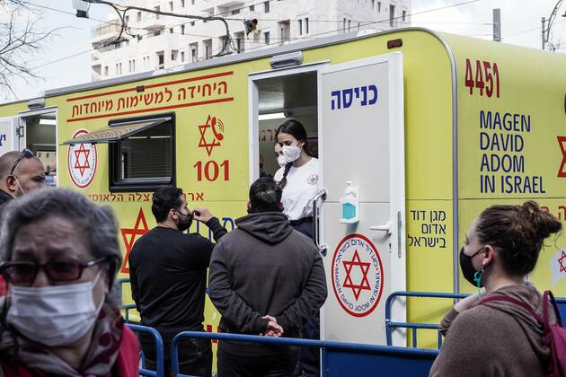 February 24, 2021, Jerusalem, Israel: The IDF Home Front Command in coordination with Magen David Adom, serving as the Israeli Red Cross organization and leading EMS, make COVID-19 vaccinating more accessible to those still in denial or refusal operating a mobile vaccination station out of a caravan at JerusalemÃ¢â‚¬â ¢s Shuk Mahane Yehuda Market. Jerusalem Israel - ZUMAa126 20210224_zap_a126_009 Copyright: xNirxAlonx