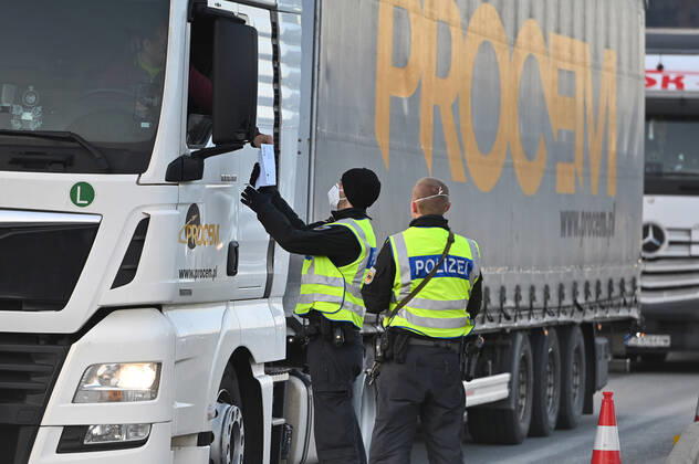 Border controls at the Austrian-German border ,border crossing Kiefersfelden border police officers control trucks, goods carriers, supply chain at the entry from Tyrol Austria to Bavaria Germany