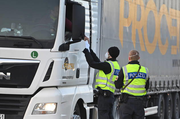 Border controls at the Austrian-German border ,border crossing Kiefersfelden border police officers control trucks, goods carriers, supply chain at the entry from Tyrol Austria to Bavaria Germany