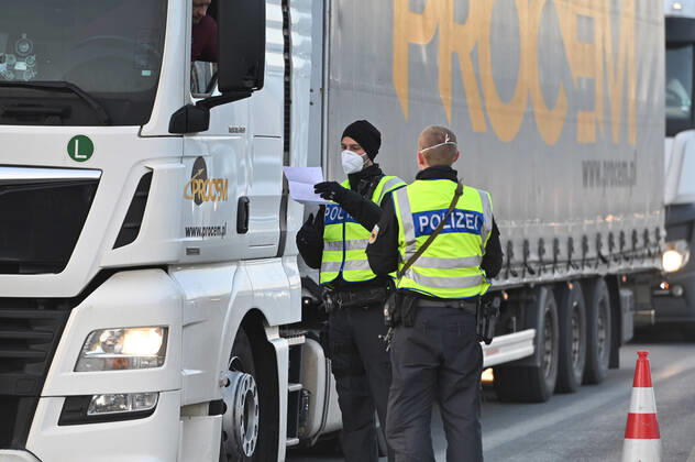 Border controls at the Austrian-German border ,border crossing Kiefersfelden border police officers control trucks, goods carriers, supply chain at the entry from Tyrol Austria to Bavaria Germany