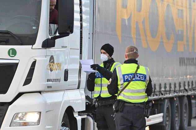 Border controls at the Austrian-German border ,border crossing Kiefersfelden border police officers control trucks, goods carriers, supply chain at the entry from Tyrol Austria to Bavaria Germany