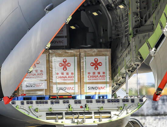 (210228) -- MANILA, Feb. 28, 2021 -- Vaccines donated by China are seen at a Philippine Air Force base in Manila, the Philippines, on Feb. 28, 2021. A batch of Sinovac vaccine CoronaVac donated by China arrived in the Philippines on Sunday, the first COVID-19 vaccine to reach the Southeast Asian country. The delivery of the vaccines allows the Philippines to start mass vaccinations soon, marking a new phase in the country s fight against the COVID-19 that infected 576,352 and killed 12,318. ) PHILIPPINES-MANILA-COVID-19-VACCINE-ARRIVAL ROUELLExUMALI 