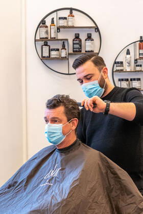 01 03 2021,Berlin,Germany,GER,with today the hairdressers nationwide are allowed to go back to their work Picture was taken in the premises of Chamun Coiffeur and Beauty Kurfürstendamm