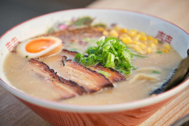 Stock photo of yummy ramen soup with boiled egg and meat in japanese restaurant ready to be served., Model released Copyright: xPhilippexDegrootex MR