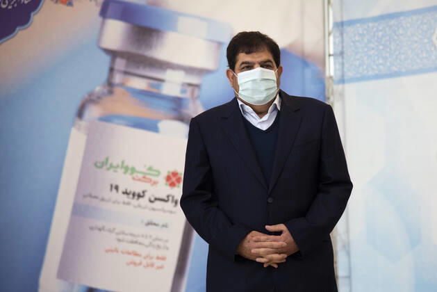 Iran: COVID-19 vaccine starts clinical trial Mohammad Mokhber, the president of the Execution of Imam Khomeini s Order, and Barekat vaccine Ventures in Barekat COVID-19 vaccine clinical trial ceremony. Tehran Tehran Iran Copyright: SobhanxFarajvan