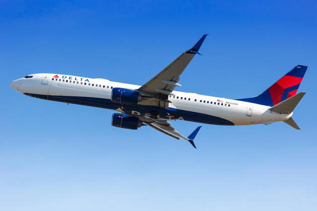 Atlanta, United States, April 3, 2019 A Delta Air Lines Boeing 737 900ER aircraft with registration number N842DN takes off from Atlanta ATL airport in the United States 1084205212