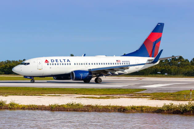 Atlanta, United States, April 4, 2019 A Delta Air Lines Boeing 737 700 aircraft with registration N303DQ at Key West EYW airport in the United States. 1084205298
