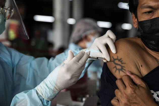 March 19, 2021, Thailand: A health worker administers a dose of CoronaVac, a Covid-19 coronavirus vaccine developed by ChinaÃ¢â‚¬â ¢s Sinovac Biotech ltd, in Bangkok, Thailand, on Friday March 19, 2021. Health workers have been vaccinating 600 residents per day, after a cluster of Covid-19 coronavirus cases were discovered at the Bang Khae market in Bangkok on Wednesday, March 17. Thailand - ZUMAm249 20210319_zip_m249_004 Copyright: xAndrexMalerbax