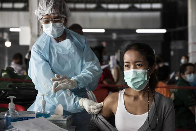 March 19, 2021, Thailand: A health worker administers a dose of CoronaVac, a Covid-19 coronavirus vaccine developed by ChinaÃ¢â‚¬â ¢s Sinovac Biotech ltd, in Bangkok, Thailand, on Friday March 19, 2021. Health workers have been vaccinating 600 residents per day, after a cluster of Covid-19 coronavirus cases were discovered at the Bang Khae market in Bangkok on Wednesday, March 17. Thailand - ZUMAm249 20210319_zip_m249_006 Copyright: xAndrexMalerbax