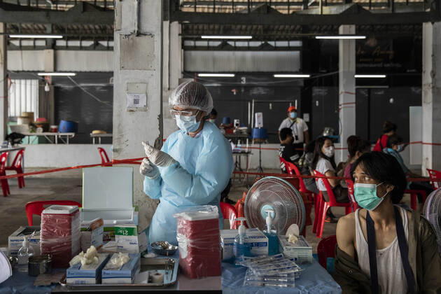 March 19, 2021, Thailand: A health worker administers a dose of CoronaVac, a Covid-19 coronavirus vaccine developed by ChinaÃ¢â‚¬â ¢s Sinovac Biotech ltd, in Bangkok, Thailand, on Friday March 19, 2021. Health workers have been vaccinating 600 residents per day, after a cluster of Covid-19 coronavirus cases were discovered at the Bang Khae market in Bangkok on Wednesday, March 17. Thailand - ZUMAm249 20210319_zip_m249_010 Copyright: xAndrexMalerbax