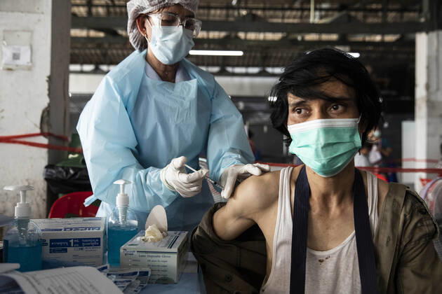 March 19, 2021, Thailand: A health worker administers a dose of CoronaVac, a Covid-19 coronavirus vaccine developed by ChinaÃ¢â‚¬â ¢s Sinovac Biotech ltd, in Bangkok, Thailand, on Friday March 19, 2021. Health workers have been vaccinating 600 residents per day, after a cluster of Covid-19 coronavirus cases were discovered at the Bang Khae market in Bangkok on Wednesday, March 17. Thailand - ZUMAm249 20210319_zip_m249_011 Copyright: xAndrexMalerbax