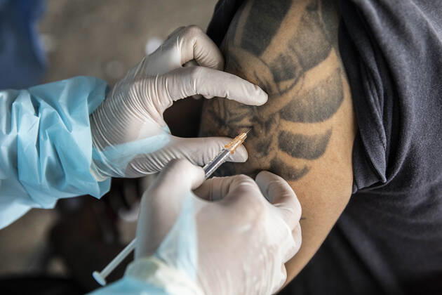 March 19, 2021, Thailand: A health worker administers a dose of CoronaVac, a Covid-19 coronavirus vaccine developed by ChinaÃ¢â‚¬â ¢s Sinovac Biotech ltd, in Bangkok, Thailand, on Friday March 19, 2021. Health workers have been vaccinating 600 residents per day, after a cluster of Covid-19 coronavirus cases were discovered at the Bang Khae market in Bangkok on Wednesday, March 17. Thailand - ZUMAm249 20210319_zip_m249_014 Copyright: xAndrexMalerbax