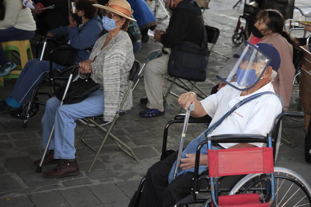 Begins Apply Of Dose Of Sputnik V In Mexico NEZAHUALCOYOTL CITY, MEXICO - MARCH 19: Elderlies wait instead to receive the dose Sputnik V vaccine, during the mass vaccination of the national vaccination program for adults over 60 years old against Covid-19 disease, at Nezahualcoyotl Sports Unit located in municipality of Nezahualcoyotl, State of Mexico. On March 19, 2021 in Nezahualcoyotl City, Mexico. Copyright: xAngelxMoralesxRizox EYEPIXGROUP_AM_19032021_5023
