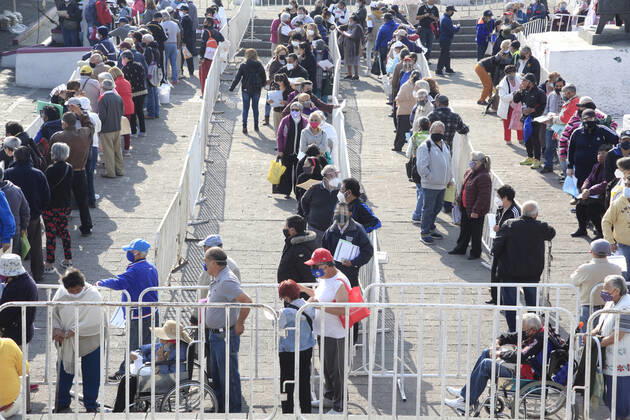 Begins Apply Of Dose Of Sputnik V In Mexico NEZAHUALCOYOTL CITY, MEXICO - MARCH 19: People wait their turn in line to be able to receive a pass and be able to access the vaccination module, where health workers apply the Sputnik V vaccine, during the mass vaccination of the national vaccination program for adults over 60 years old against Covid-19 disease, at Nezahualcoyotl Sports Unit located in municipality of Nezahualcoyotl, State of Mexico. On March 19, 2021 in Nezahualcoyotl City, Mexico. Copyright: xAngelxMoralesxRizox EYEPIXGROUP_AM_19032021_5031