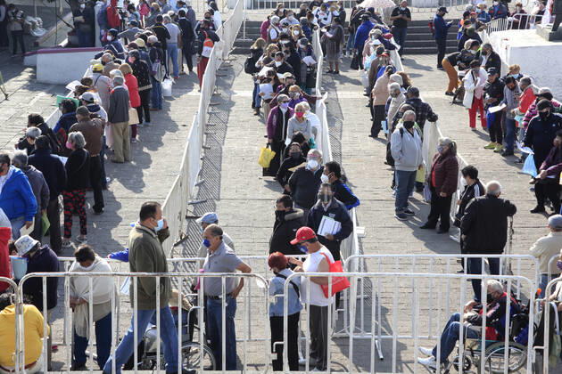 Begins Apply Of Dose Of Sputnik V In Mexico NEZAHUALCOYOTL CITY, MEXICO - MARCH 19: People wait their turn in line to be able to receive a pass and be able to access the vaccination module, where health workers apply the Sputnik V vaccine, during the mass vaccination of the national vaccination program for adults over 60 years old against Covid-19 disease, at Nezahualcoyotl Sports Unit located in municipality of Nezahualcoyotl, State of Mexico. On March 19, 2021 in Nezahualcoyotl City, Mexico. Copyright: xAngelxMoralesxRizox EYEPIXGROUP_AM_19032021_5032