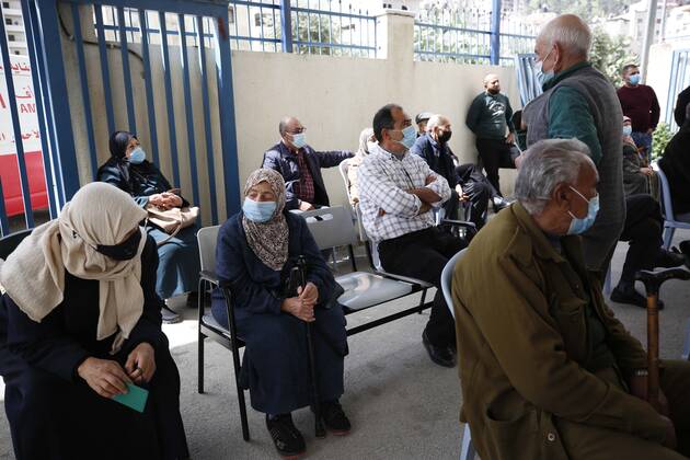 March 21, 2021, Nablus, West Bank, Palestinian Territory: Palestinians receive the dose of the coronavirus disease (COVID-19) vaccine during a campaign to vaccinate front-line for those aged over 75, cancer patients and medical personnel, at the health ministry in the West Bank city of Nablus, on March 21, 2021 Nablus Palestinian Territory - ZUMAap3_ 20210321_zaf_ap3_036 Copyright: xShadixJarar Ahx