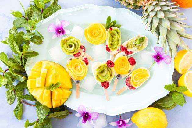 Homemade popsicles with fruit and coconut milk 1079706553