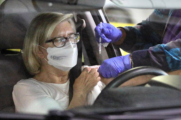 February 8, 2021, Orlando, FL, USA: A Florida resident gets vaccinated at the Orange County Convention Center in Orlando, Florida on Feb. 8. The Florida Department of Health is administering COVID-19 vaccinations at the convention center s North Concourse loading dock, by appointment only. Florida recorded Thursday the most COVID-19 cases since March 2. Orlando USA - ZUMAm67_ 20210208_zaf_m67_038 Copyright: xJoexBurbankx