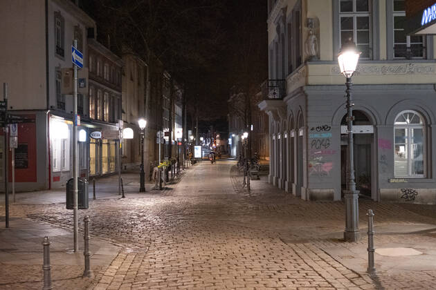 Like an abandoned city. Aachen on Easter vigil between 10 p.m. and 11 p.m. View of the deserted pedestrian zone Am Markt. In Aachen on April 3, 2021. GERMANY - AACHEN - EASTER Easter 2021 Covid Pandemic
