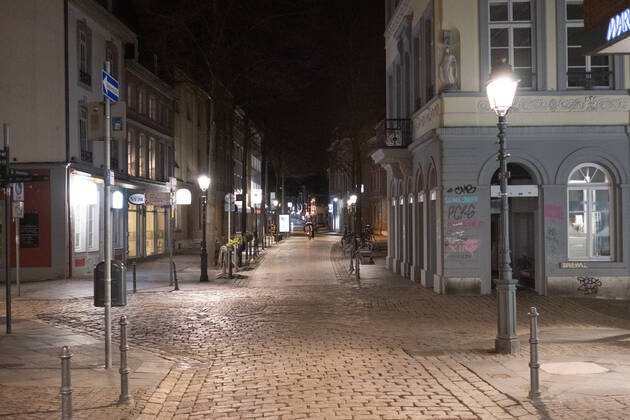 Like an abandoned city. Aachen on Easter vigil between 10 p.m. and 11 p.m. View of the deserted pedestrian zone Am Markt. In Aachen on April 3, 2021. GERMANY - AACHEN - EASTER Easter 2021 Covid Pandemic