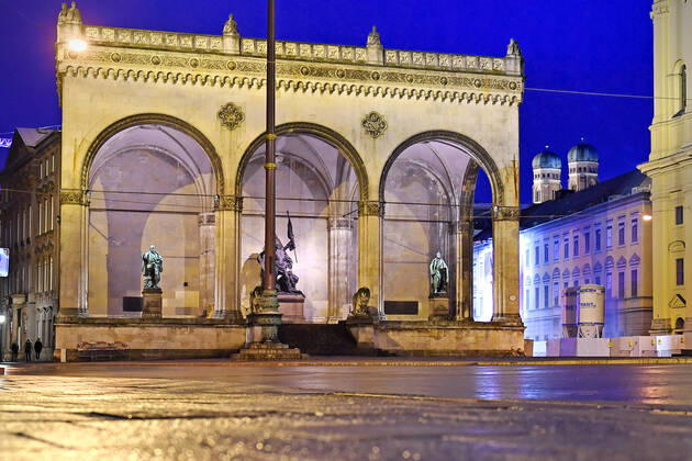 Theme image Is the bridge lockdown coming to break the third wave Deserted Odeonsplatz in Munich with Feldherrnhalle and Frauenkirche in the background on 06 04 2021 Night curfew,curfew,night shot,