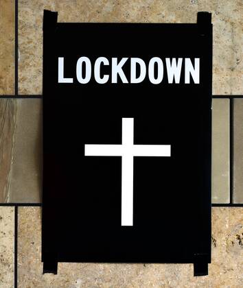 Poster death cross on wall, lockdown, shutdown, Corona crisis, Stuttgart, Baden Württemberg, Germany, Europe Copyright: imageBROKER/MichaelxWeber ibximw06719558