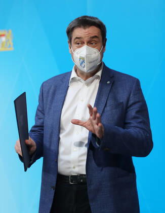 Press conference of Prime Minister Markus Söder Soeder Dr Markus Söder making small talk with some journalists after the official press conference, Munich Bavaria Germany Prinz Carl Palais