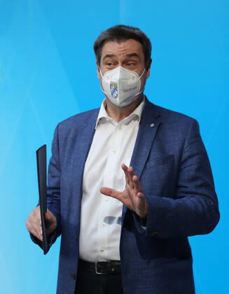 Press conference of Prime Minister Markus Söder Soeder Dr Markus Söder making small talk with some journalists after the official press conference, Munich Bavaria Germany Prinz Carl Palais